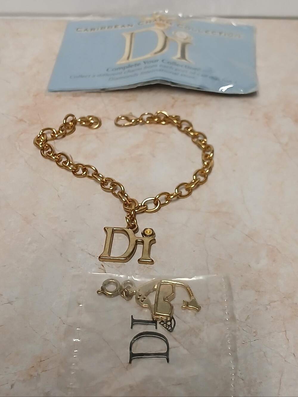 Chain Bracelet With 'Di' Charm Chain. Not Real Gold But New